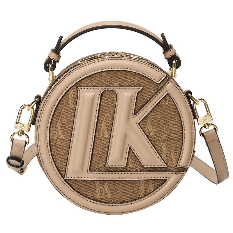 Hong Kong niche minimalist genuine leather cake crossbody 2024 new trendy and fashionable one shoulder small round bag_voghion.com