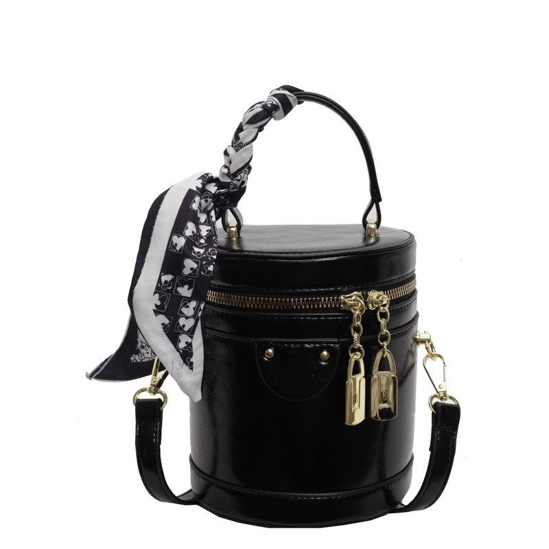 Bolso de cubo popular de este año, nuevo bolso de verano 2025, bolso de hombro de alta gama, bolso de mensajero retro de todo fósforo para mujer