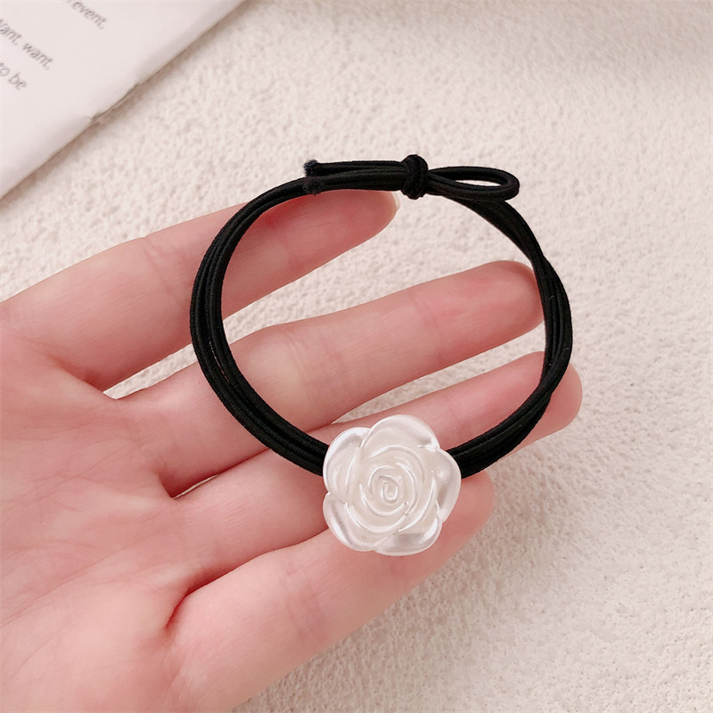 Versión coreana de la cuerda de la cabeza de la camelia accesorios para el cabello niña atar la cabeza temperamento de alta elasticidad rosa banda de goma anillo para el cabello cuerda para el cabello