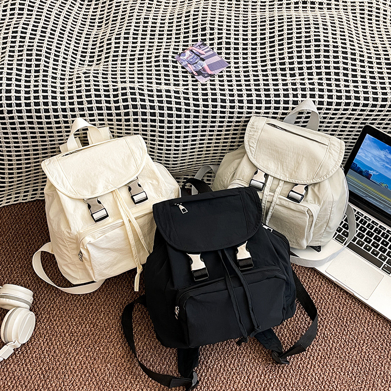 Mochila de lona de viajero multifuncional para estudiantes en clase Bolso femenino simple 2024 Nuevo estilo estilo coreano mochila pequeña estilo universitario