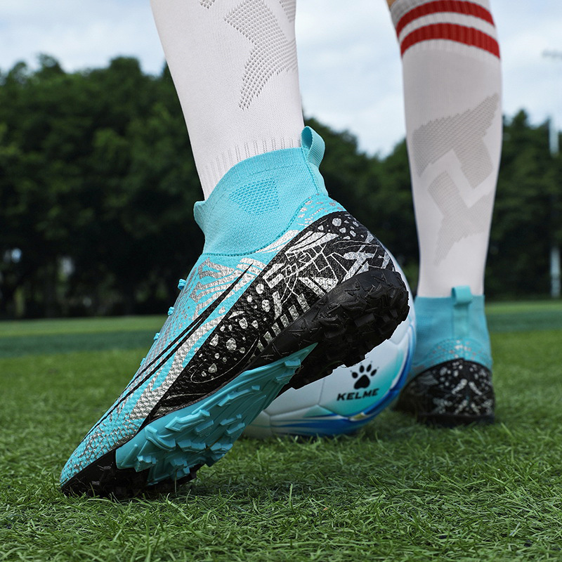 Zapatos de fútbol de clavos TF transfronterizos zapatos de fútbol de clavos adultos zapatos de entrenamiento de estudiantes adolescentes al por mayor