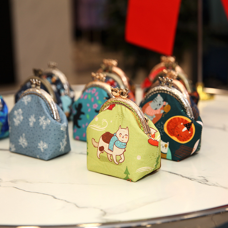 Bolsa de material de bordado bricolaje hecho a mano 8,5 boca Bolsa de Oro patchwork bolsa antigua bolsa transfronteriza inglés gato bolsa de almacenamiento