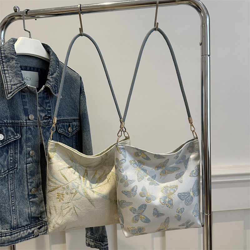 Elegante bordado de seda dorada de alta calidad bambú mariposa nuevo estilo 2024 nuevo estilo chino bolso debajo de la axila