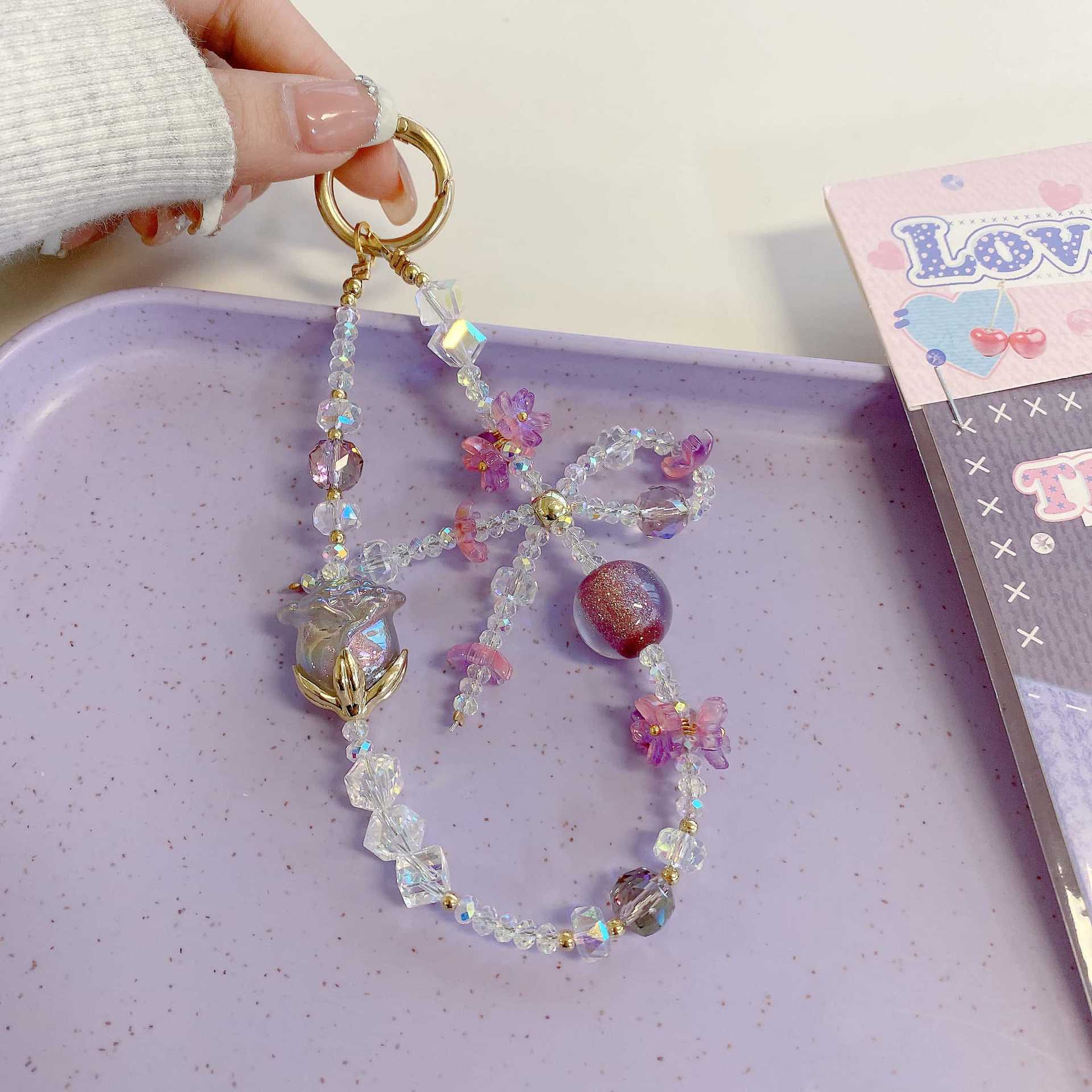 Boutique hecho a mano de alta gama teléfono móvil cadena colgante mujer tulipán sueño púrpura cadena larga moda teléfono móvil cordón largo mensajero colgante