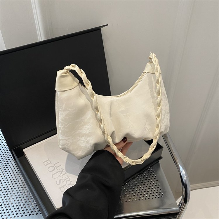 Diseño francés de nicho nubes plegadas bolsas debajo de las axilas para mujeres 2024 nuevo verano textura alta mochila de hombro