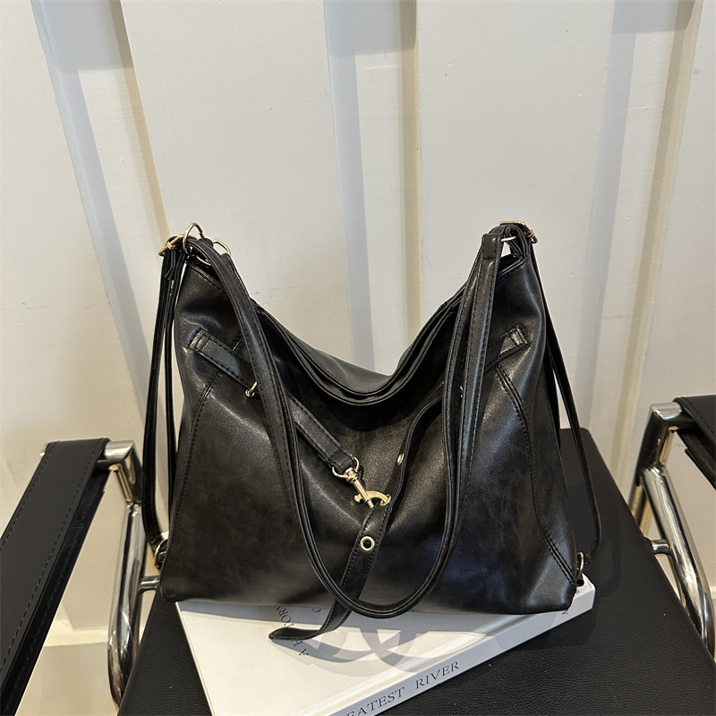 Versátil gran capacidad retro 2024 nuevo otoño invierno ocio de color sólido de hombro simple de doble portátil de hombro para viajar bolso de hombro suave