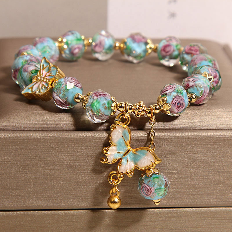 Nueva pulsera de vidrio azul de jardín de rosas de estilo chino para mujer, pulsera colgante de mariposa de lujo ligero de nicho, joyería de alta calidad