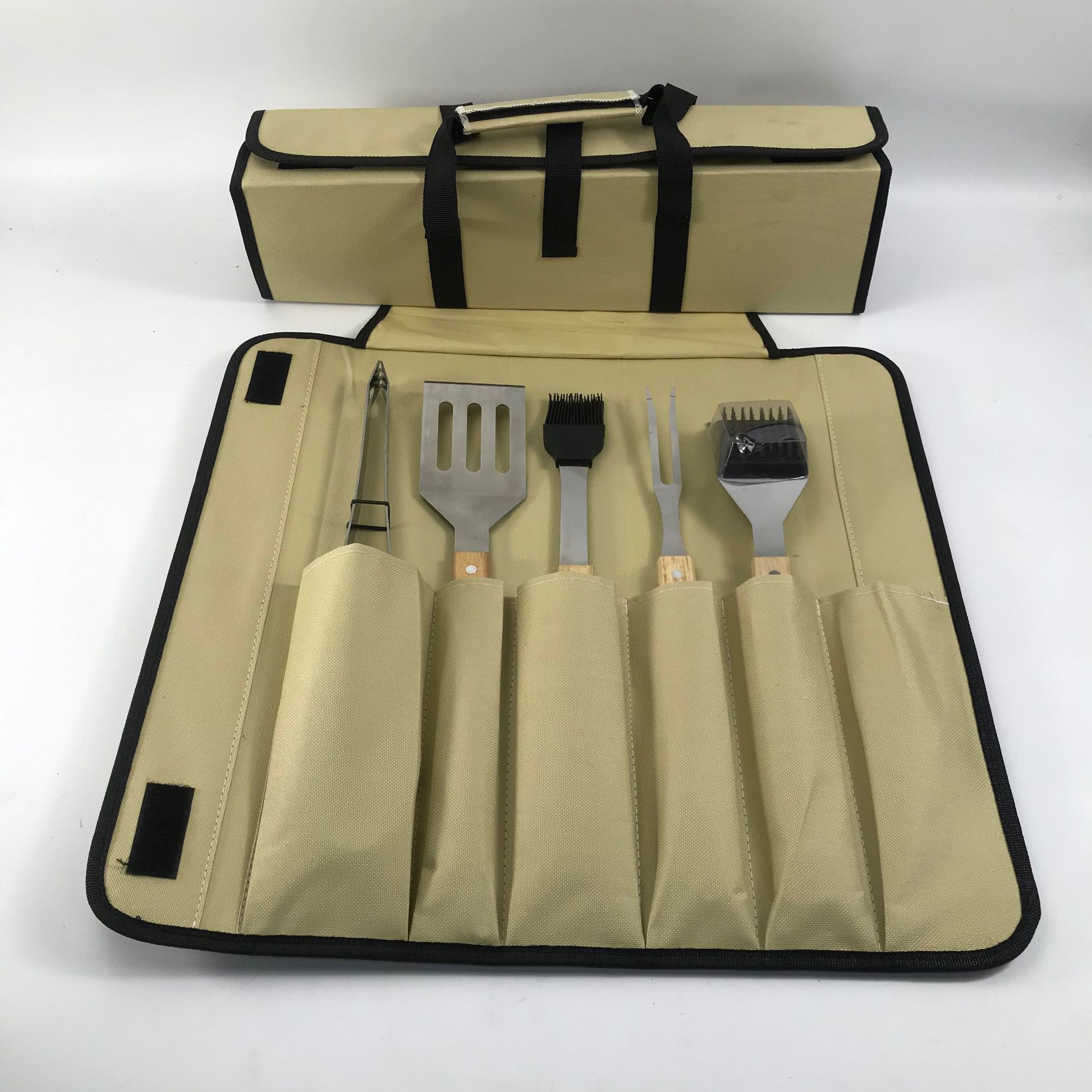 Mango de madera conjunto de parrilla bolsa de tela de suministro de comercio electrónico transfronterizo caja de aluminio horquilla de acero inoxidable parrilla de parrilla BBQ herramientas