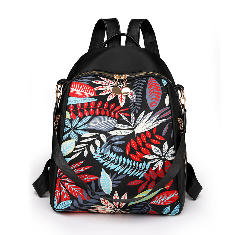 Bolsos para mujer 2023 nueva mochila de nylon para mujer coreana moda salvaje color de contraste mochila de viaje al aire libre al por mayor