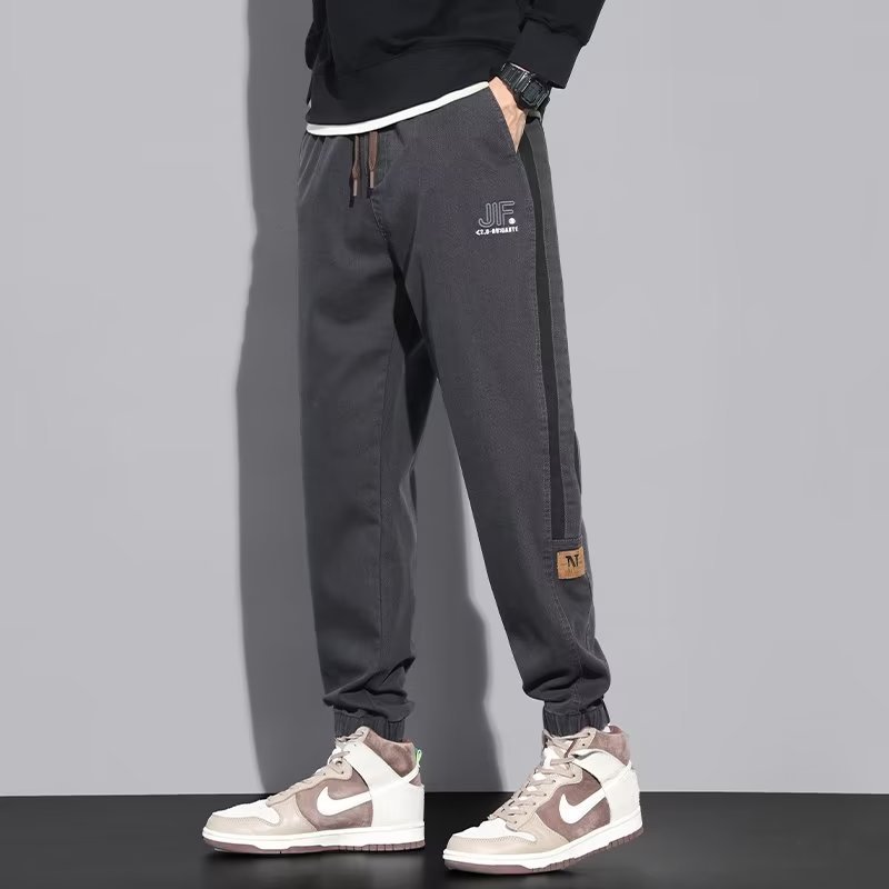 Pantalones casuales, marca de moda de otoño e invierno para hombres, pantalones bonitos, pantalones largos de Harlan de mezclilla de nuevo estilo, marea de gran tamaño para hombres