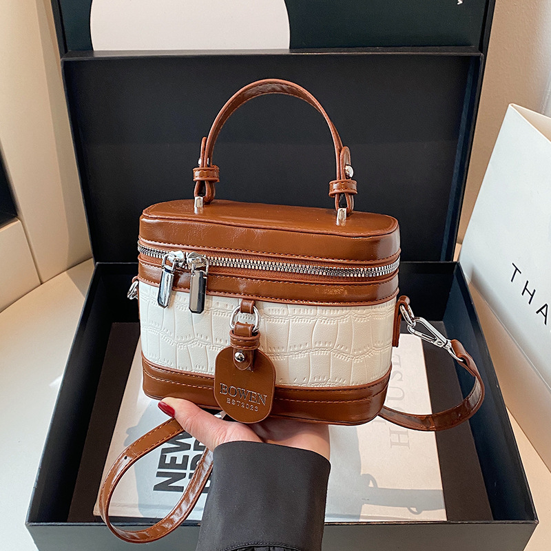 Bolso de textura transfronteriza 2025 primavera nuevo bolso femenino personalizado bolso de hombro con patrón de piedra bolso de mensajero de color de contraste de moda