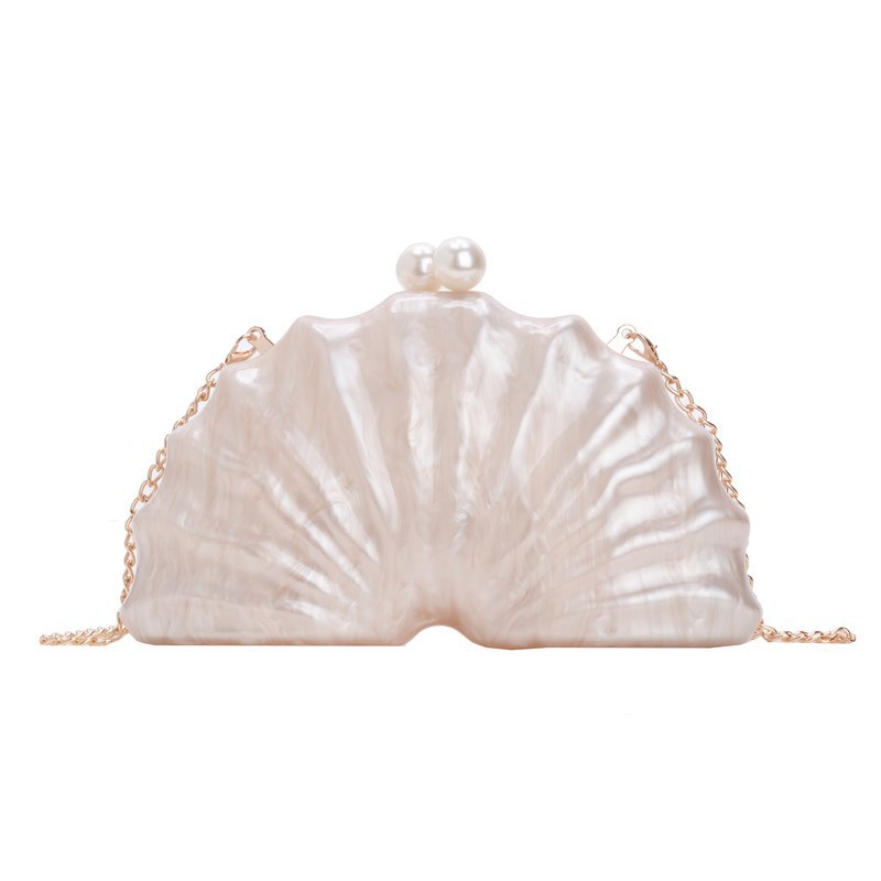 Europa y los Estados Unidos nuevos paquetes de cena de damas de hombro único en forma de concha acrílica de mano de lujo ligero paquete de moda de noche