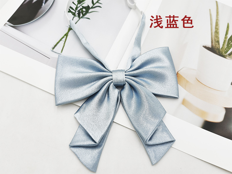 Spot al por mayor color sólido superficie brillante vino negro cuello rojo flor femenino estilo universitario nuevo estilo cola de golondrina plegable pajarita de raíz de pluma grande