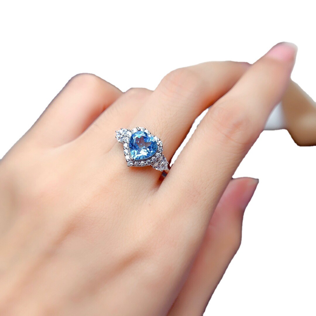 Transmisión en vivo nuevo estilo imitación natural suizo Topa azul traje anillo colgante pendientes Mozambique granate pendientes