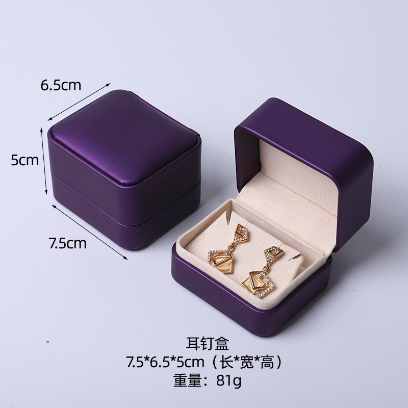 Caja de joyería rosa de alta calidad de cuero pu caja de embalaje de marca de joyería logotipo colgante pulsera collar caja de anillo