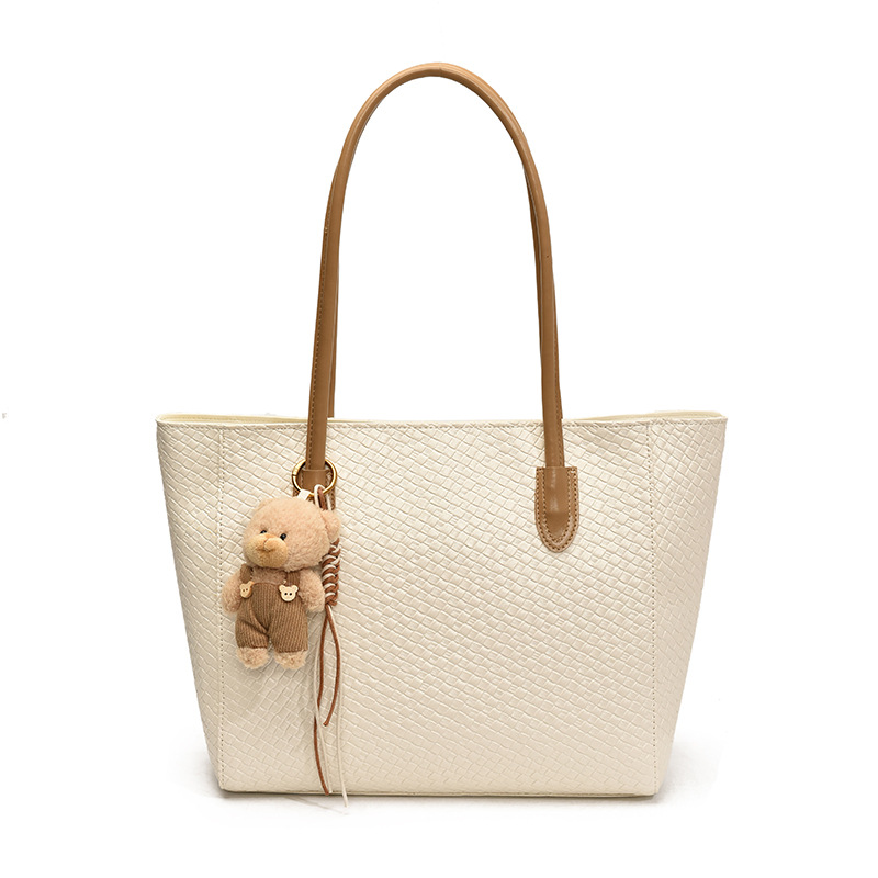 Bolsa de moda retro de gran capacidad para mujeres 2025 nueva bolsa de hombro transfronteriza simple textura casual bolso de abrigo