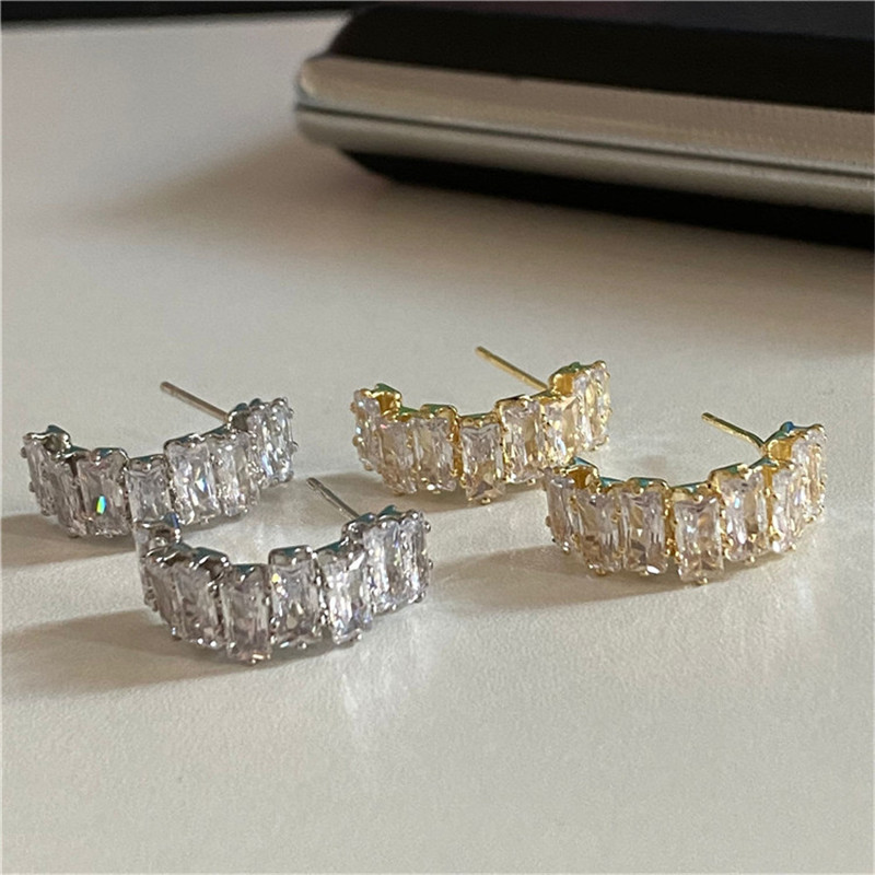 Sophisticated crooked fashionable universal earrings with zircon