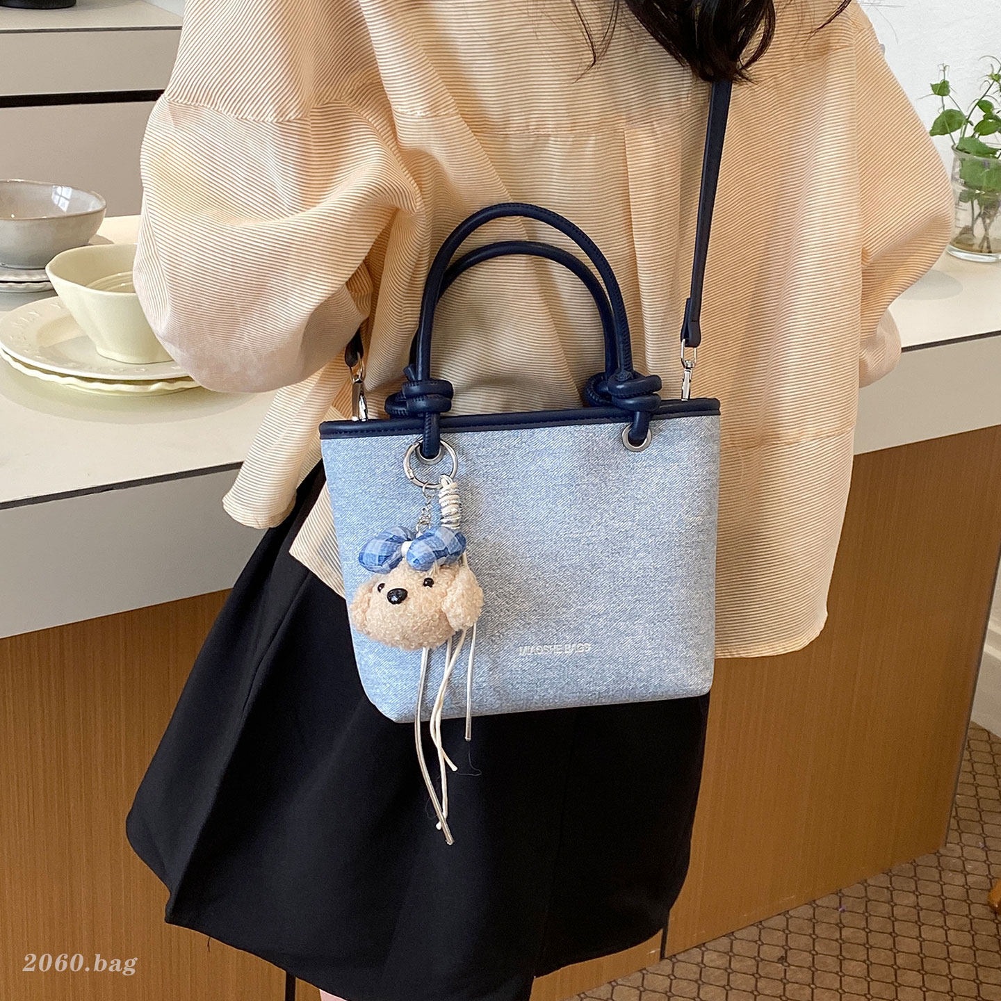 Bucket nuevo bolso de hombro de mujer diseño versátil portátil de moda coreana nicho verano 2026 pequeño