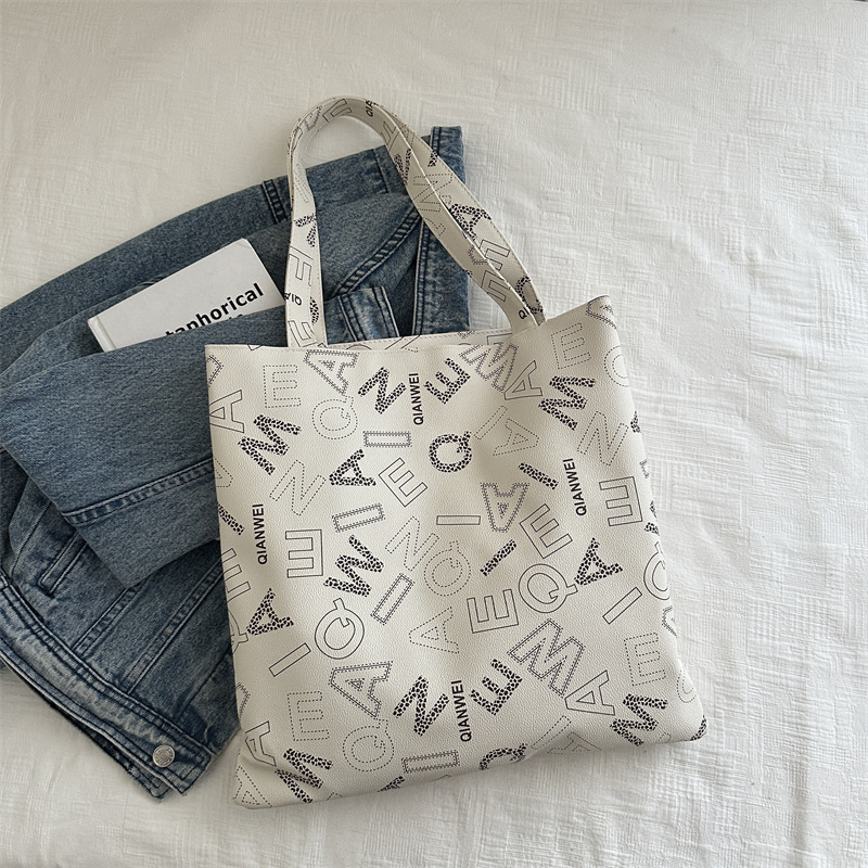 Otoño y invierno retro gran capacidad 2024 nuevo bolso de mujer bolso de hombro universal bolso de viaje de alta calidad bolso especial