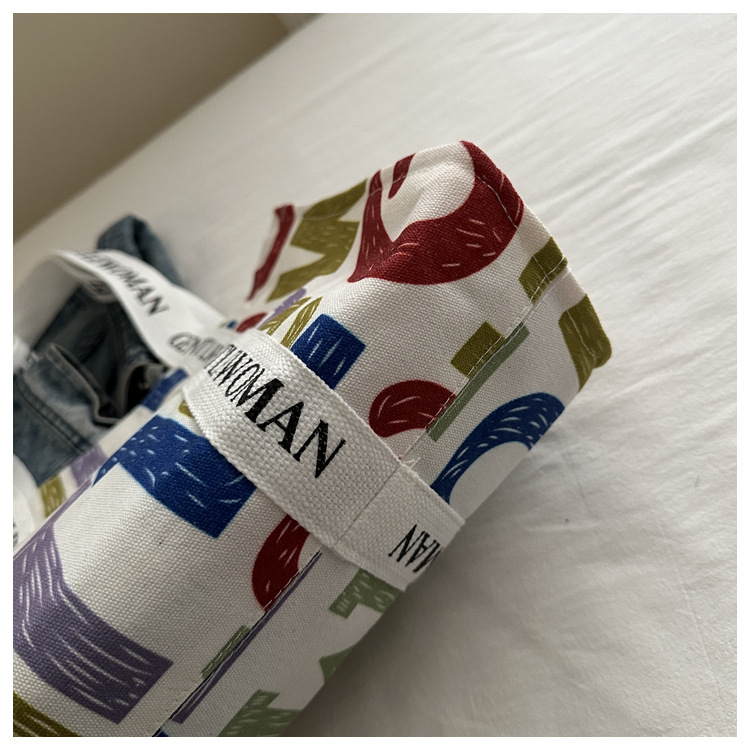 Large-capacity letter canvas bag 2025 new style ins printed versatile shoulder bag for commuting and portable ladies' tote bag undefined