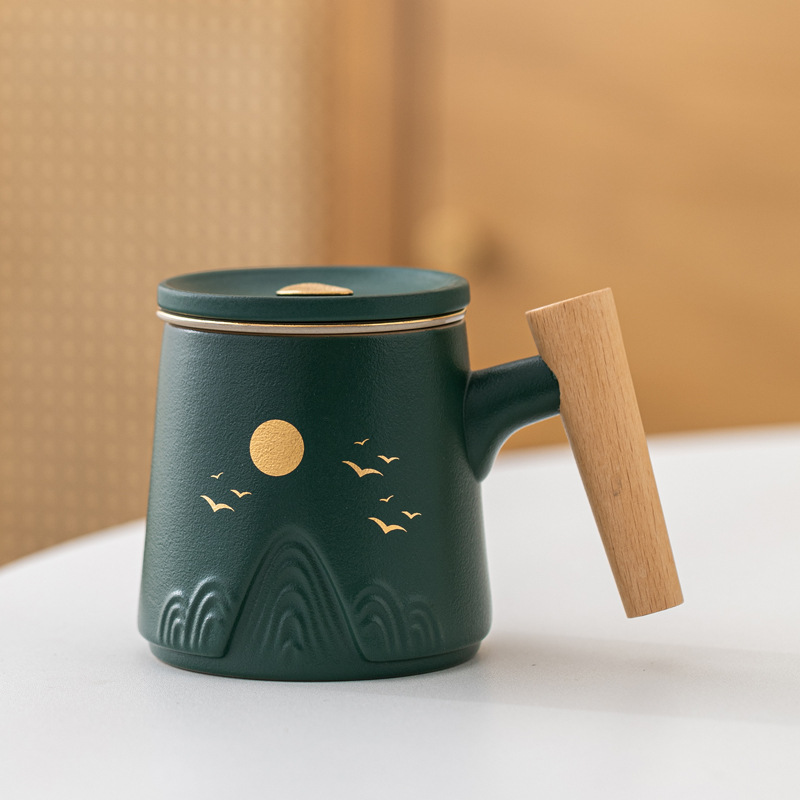 Guofeng Wenchuang marca taza de cerámica Zhoushan tres piezas juego de regalo de mano taza de calentamiento tallado comercial LOGO nombre