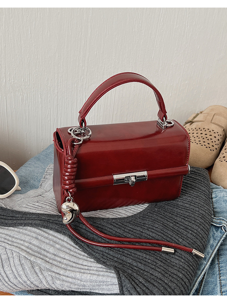 Bolso de mano de alta sensación para mujeres 2026 nuevo bolso cuadrado ligero de textura de lujo estilo coreano nicho bolso de hombro de mujer