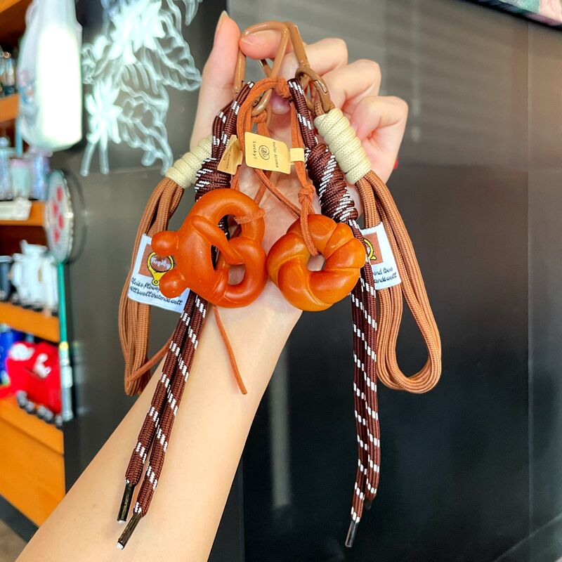 Cross-Border Ins Blogger Miu Style Niche Braided Rope Keychain Accessories Cute Bagel Alkaline Water Knot Bread Pendant Wholesale