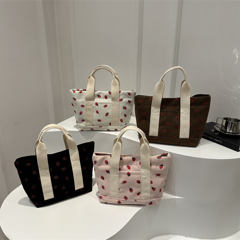 2024 otoño nueva gran capacidad simple moda encantadora impresión de fresas de moda coreana bolsos de chicas de estilo universitario