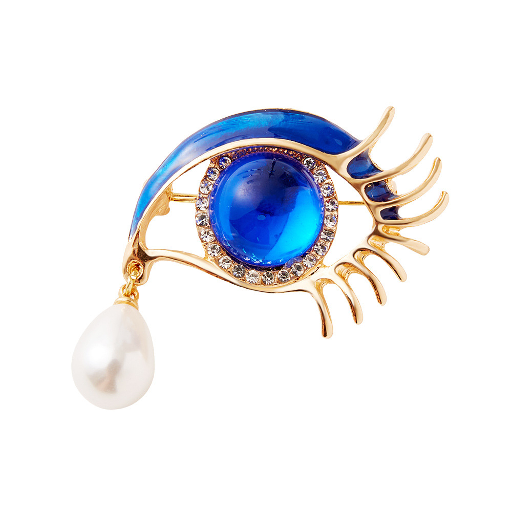 Spilla occhio con perla barocca vintage da donna per tailleur_voghion.com