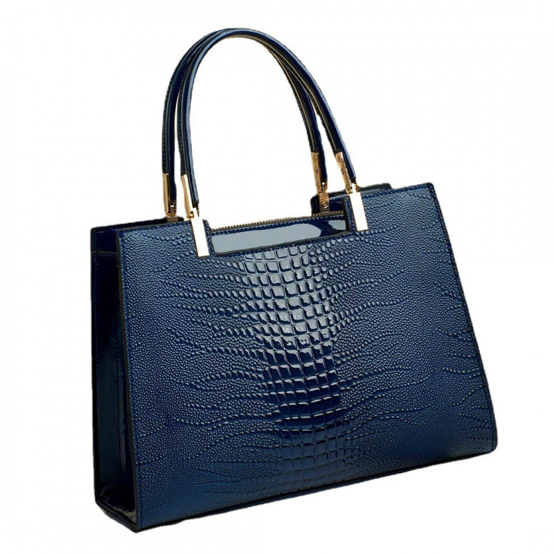 Temperamento sensación de bolso 2025, nueva moda de cuero brillante, bolsos de hombro de gran capacidad, bolsas transfronterizas