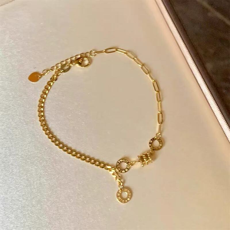 Baoman's New Stylish and Versatile Waist-Shaped Bracelet for Women with Fortune Beads and Tassels in Titanium Steel Baoman's New Stylish and Versatile Waist-Shaped Bracelet for Women with Fortune Beads and Tassels in Titanium Steel