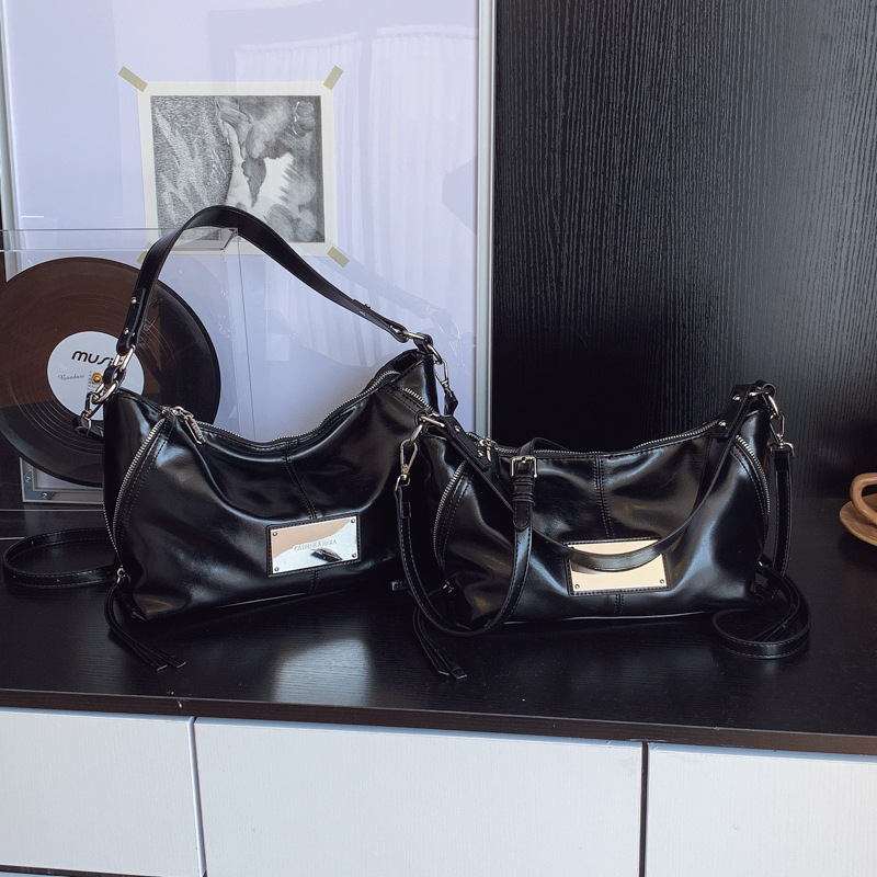 Transfronterizos suaves retro bolsas de brazo portátiles mujeres otoño y invierno 2025 nueva moda versátil bolsas de hombro bolsas de transporte