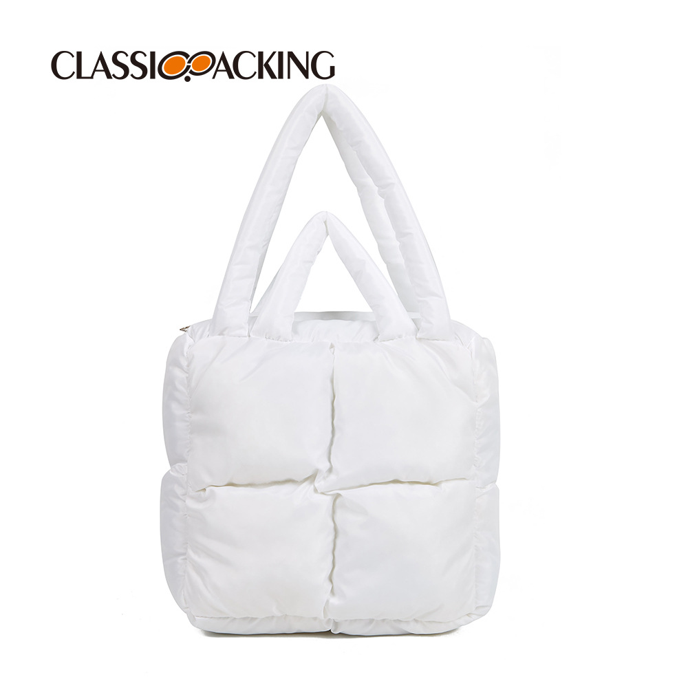 2023 nuevo bolso de otoño e invierno bolso de diseño de nicho bolso de mano lleno de algodón de Corea del Sur bolso de algodón acolchado de alta calidad chaqueta abajo bolsa