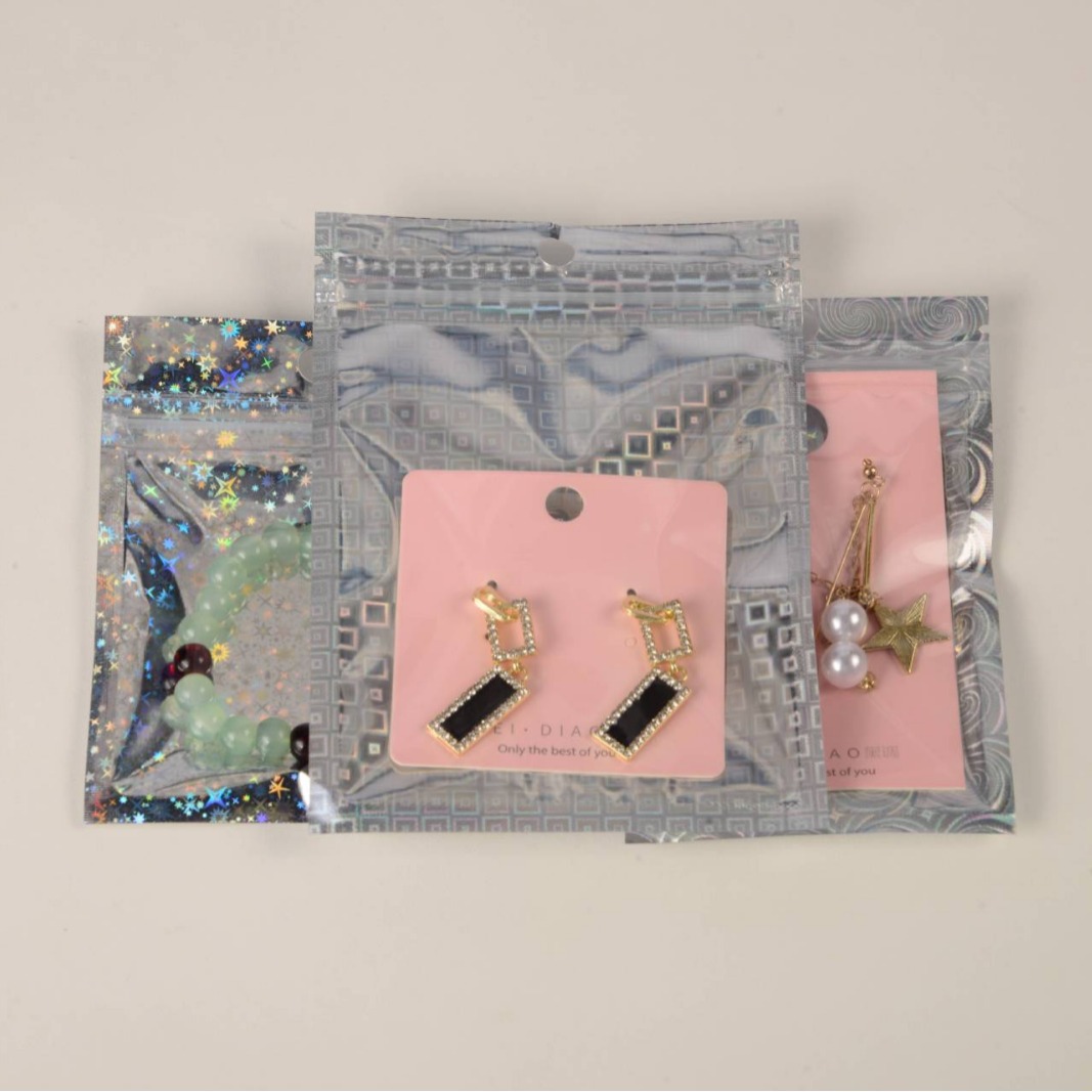 Bolsa de embalaje de láser de colores que cambia de color bolsa de embalaje de joyería bolsa de láser bolsa de auto-sellado