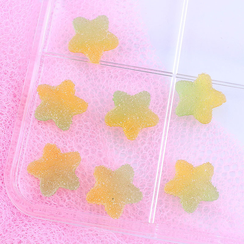 Gradiente de dibujos animados simulación estrella suave caramelo accesorios DIY resina suave pegamento caramelo al por mayor crema pegamento teléfono caso material