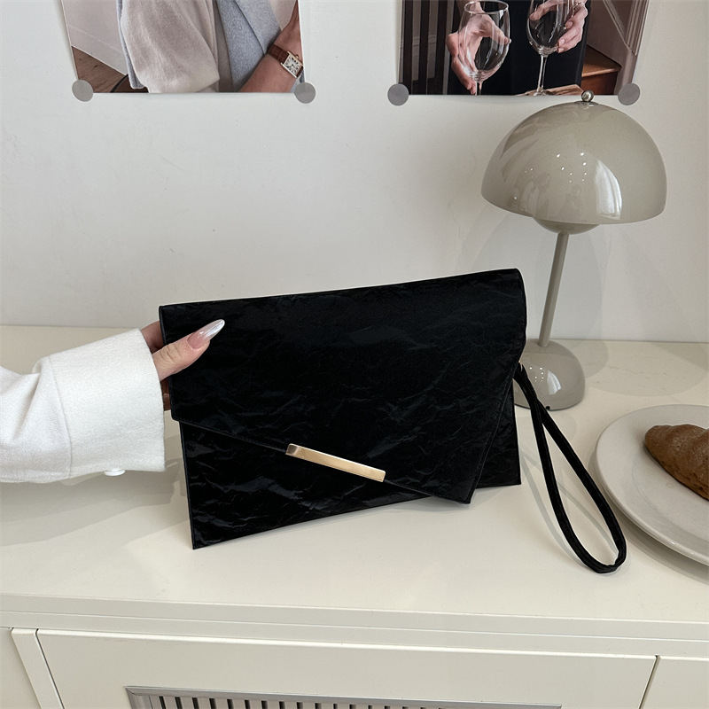 Bolso de cena de estilo coreano simple y versátil para mujer, lujo ligero, personalidad de color sólido exquisito, temperamento casual, bolso de mano avanzado
