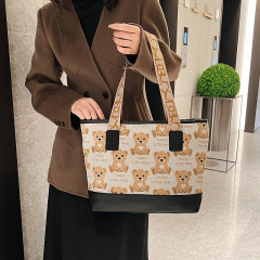 卸売り大容量キャンバスバッグ女性2024冬のシンプルなファッションシングル肩のバッグショッピング質感のショルダーバッグ
