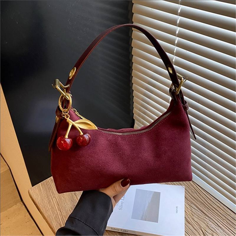 Transfronterizos de alto nivel retro bolso de brazo portátil para mujeres 2025 nuevo invierno mochila de hombro mochila de moda