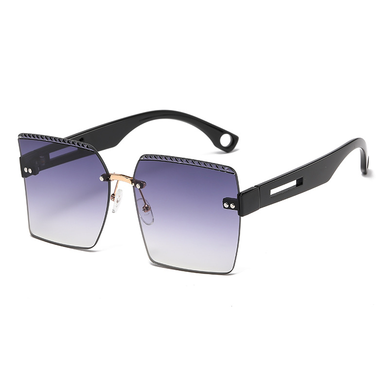 Gafas de sol a prueba de sol curvadas europeas y americanas gafas de sol a prueba de UV de corte liso de moda de las mujeres