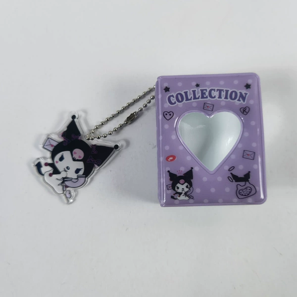 Curomi with an acrylic pendant