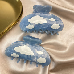 創意的な青空と白い雲の組み合わせのヘアピンの後頭部のヘアピン