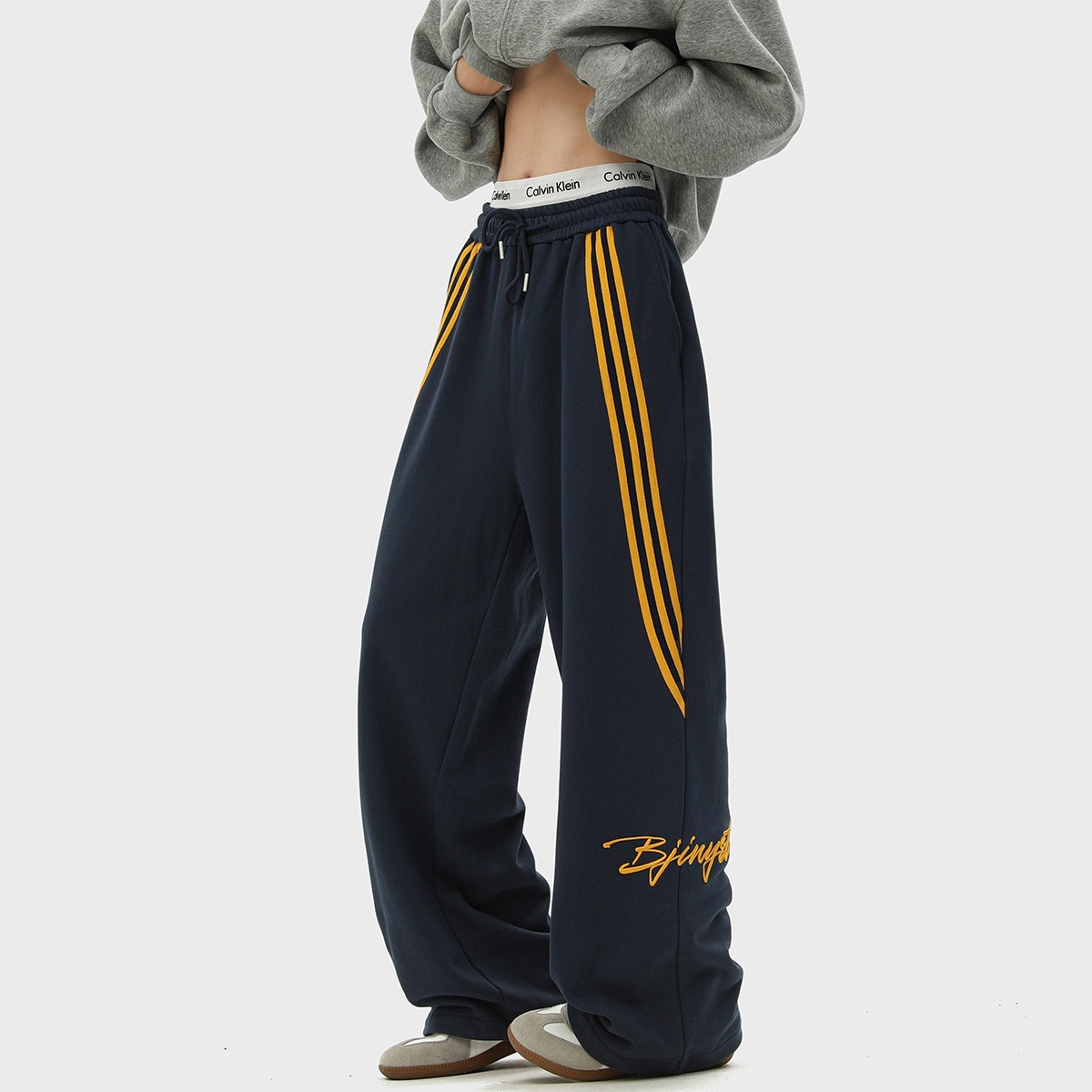 Pantalones de protección de otoño nuevo estilo de ropa de trabajo americano azul tibetano dos barras de calzada deportiva calzado de la escuela para hombres pantalones casuales
