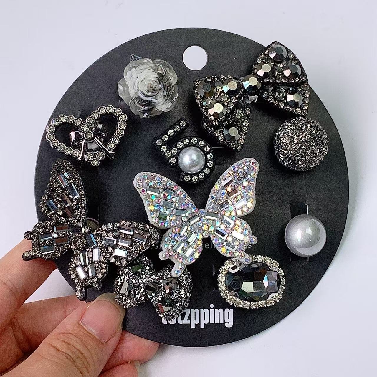 韓国の新しい適応クリスタル下駄 DIY アクセサリー黒と白の蝶ラウンドカードパッケージ装飾バックルゼリー靴花
