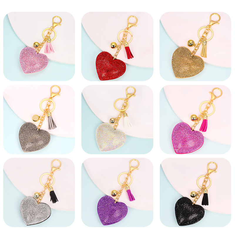 Venta caliente transfronteriza terciopelo coreano diamante color sólido amor corazón pelo bola llavero colgante bolso de las mujeres accesorios personalización