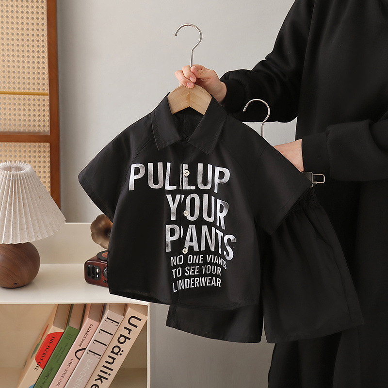 7192 traje de verano para niños 2025 nueva camisa con estampado de letras de manga corta de estilo occidental verano de dos piezas para niños verano