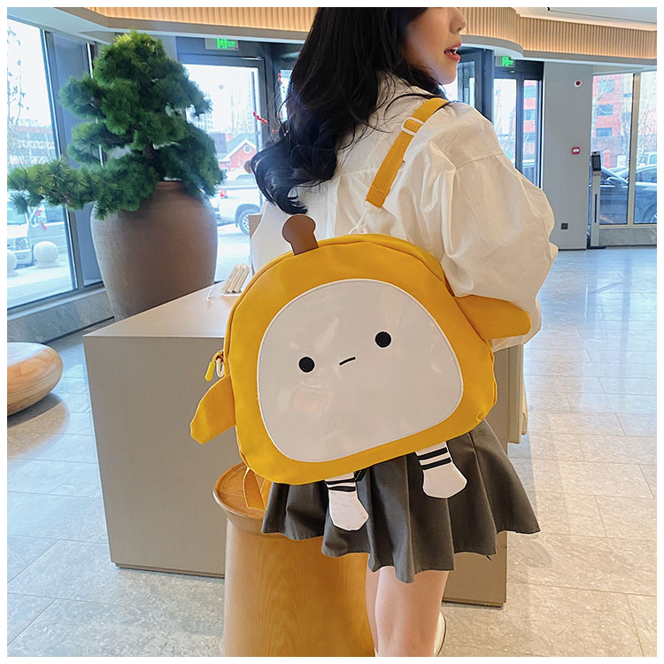 The new 2024 children's egg-shaped party backpack is a cute cartoon canvas single-shoulder bag and a fashionable and stylish small backpack undefined