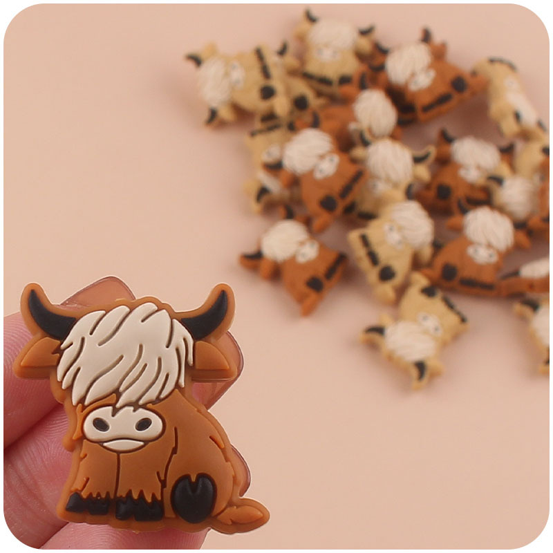 Bebé suministros de dibujos animados de silicona vaca mordedor creativo DIY bebé molar pezón cadena anti-gota cadena accesorios pequeños