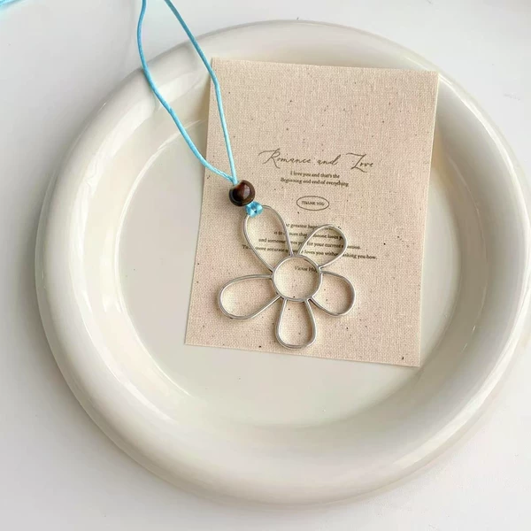 Blue rope flower necklace