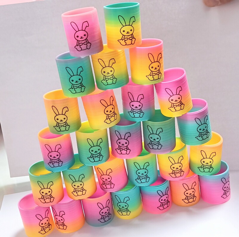 子供の魔力の虹の輪の表情の笑顔の虹のスプリングの輪の露店の弾力の積み重ねの輪の知育のノスタルジックなおもちゃ|undefined