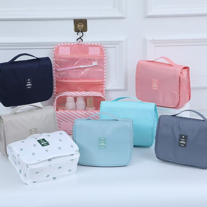 Bolsa de maquillaje de celebridad en línea Twill portátil coreano simple bolsas de lavado de corazón de niña de gran capacidad bolsas de maquillaje de hombre gancho bolsa